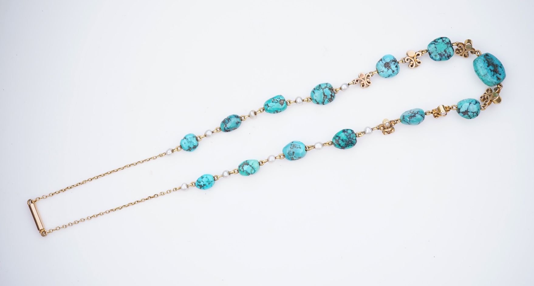A turquoise and seed pearl necklace, early 20th century